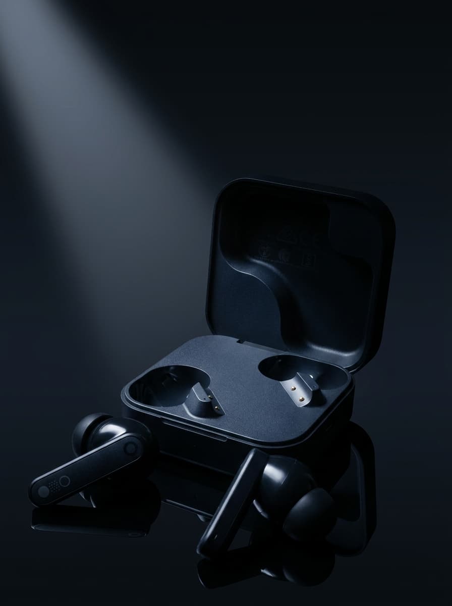 earbuds photoshoot in Mirrored Surface — Infinite Depth, Dark & Moody style