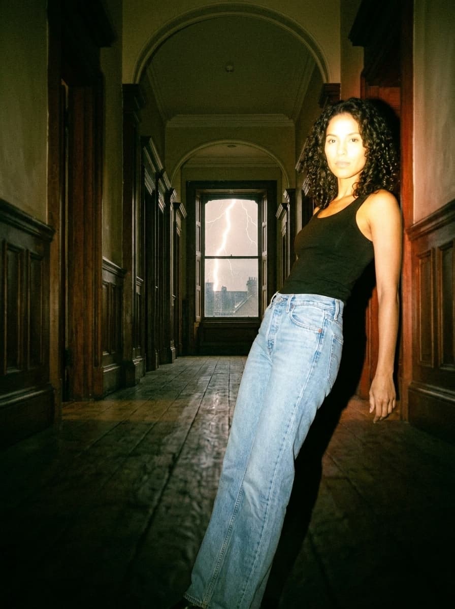 jeans photoshoot with Valentina in Storm-Lit Corridor, Disposable Camera style