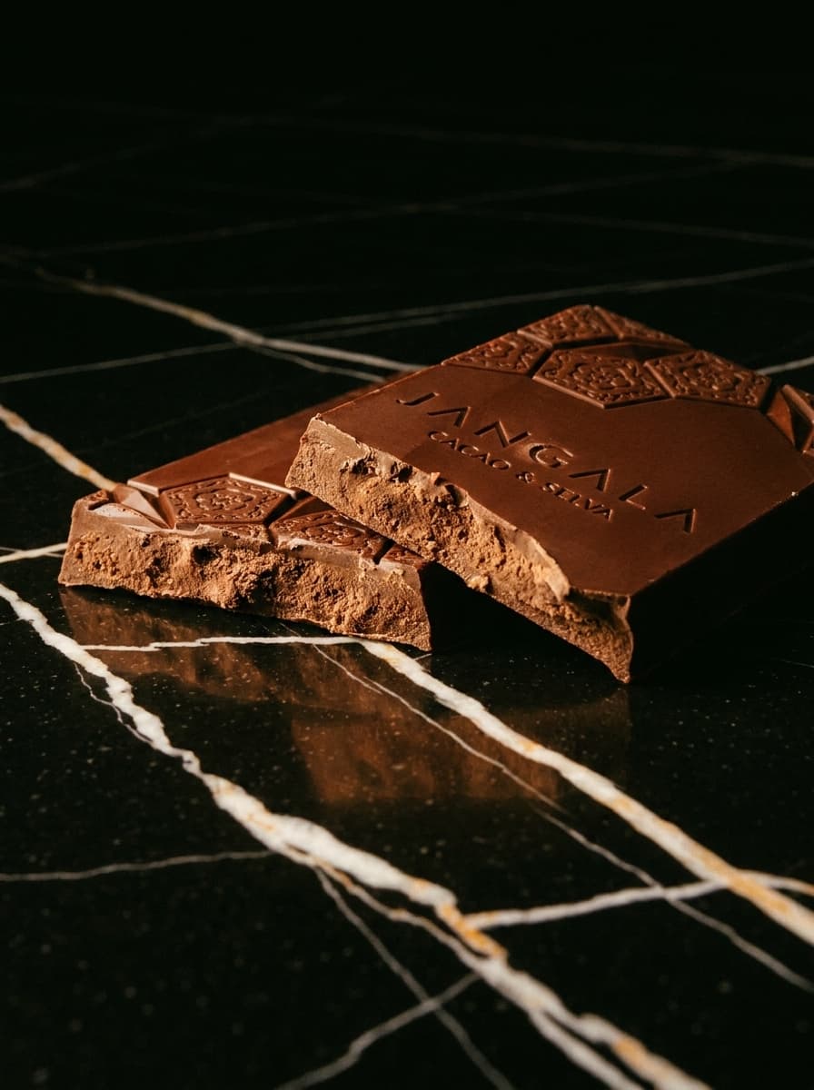 chocolate photoshoot in Nero Marquina Marble — Midnight Gold, Analog Film style